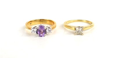 Lot 204 - A 14ct gold, amethyst and diamond ring, the...