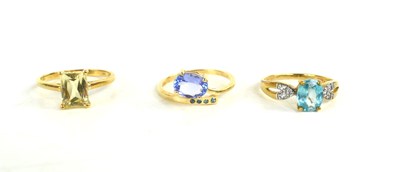 Lot 159 - A 10ct gold and blue topaz ring, size N, 1.93g,...