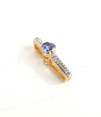 Lot 86 - A 9ct gold, tanzanite and diamond set pendant,...