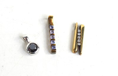 Lot 171 - Three 9ct gold pendants, to include a 9ct gold...