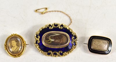 Lot 149 - Three Victorian mourning brooches to include a...