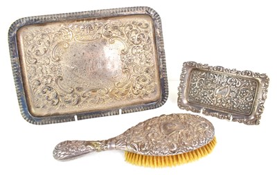 Lot 344 - Two Edwardian silver trays with repousse...