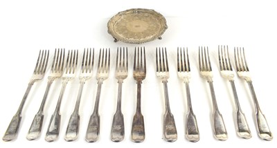 Lot 340 - An antique Irish silver salver with engraved...