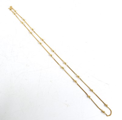 Lot 133 - A 9ct gold, ball and chain necklace, 6.1g.