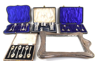 Lot 338 - A silver table mirror, a set of silver Walker...