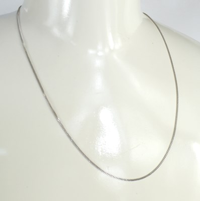 Lot 100 - A 9ct white gold fine link necklace, with...