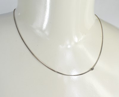Lot 174 - An 18ct white gold fine link chain necklace,...