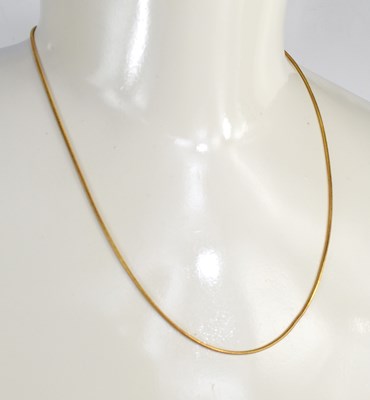 Lot 188 - An 18ct gold 'snake' link necklace, with crab...