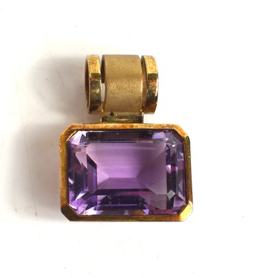 Lot 209 - A Heidi Kjeldsen 9ct gold and amethyst pendant,...