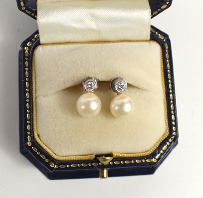 Lot 135 - A pair of 18ct white gold, diamond and pearl...