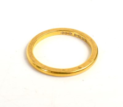 Lot 175 - A 22ct gold wedding band, size L, 2.8g.