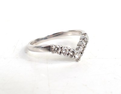 Lot 207 - An 18ct white gold and diamond wishbone ring,...