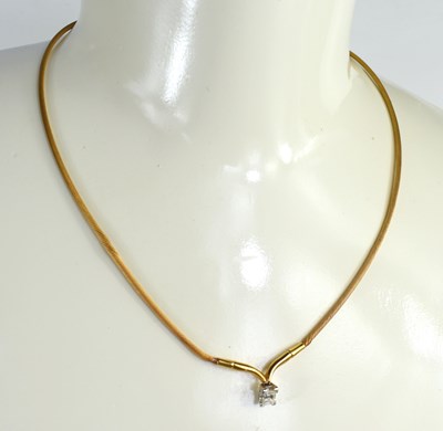 Lot 256 - An 18ct gold and diamond necklace, the 'snake'...