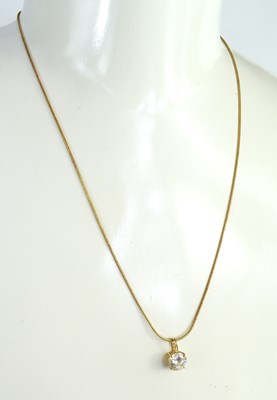 Lot 190 - A 9ct gold and cubic zirconia pendant necklace,...
