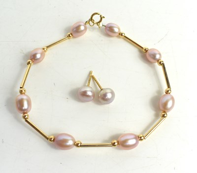 Lot 95 - A 9ct gold and pink pearl bracelet, composed...