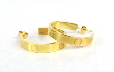 Lot 7 - An 18ct gold pair of Amanda Mansell half hoop...