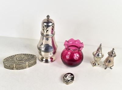 Lot 330 - A silver and enamel pill box depicting a lady...