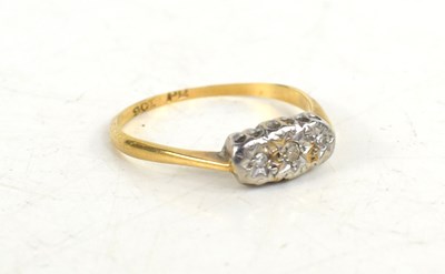 Lot 89 - A 9ct gold and diamond ring, three chip...