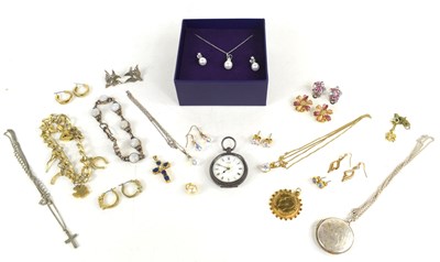 Lot 55 - A silver and pearl necklace with matching...