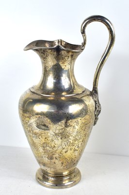 Lot 201 - A silver jug/ ewer stamped with the makers...