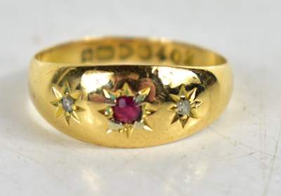 Lot 154 - An 18ct gold, diamond and ruby gypsy style...