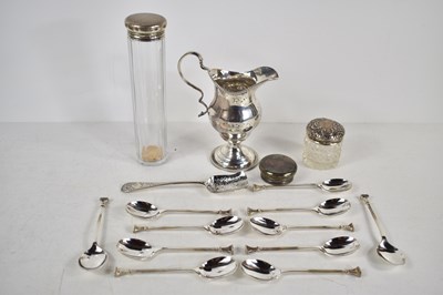 Lot 215 - A group of silver to include a set of ten...