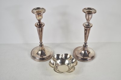 Lot 209 - A pair of silver candlesticks with fluted...