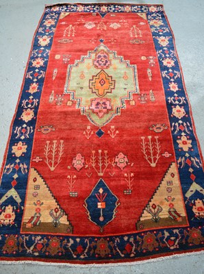 Lot 491 - An early 20th century Nomadic rug, 297 by 153cm.