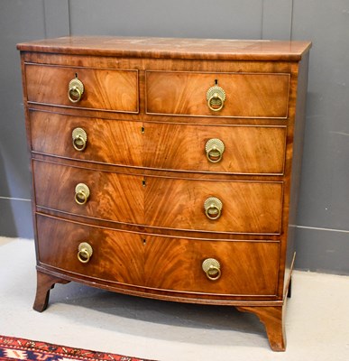 Lot 576 - A Victorian bow front chest of drawers, with...