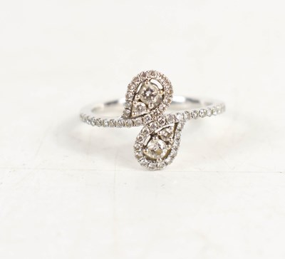Lot 82 - An 18ct white gold and diamond floral double...