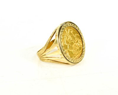 Lot 97 - A 9ct gold sovereign set ring, the full gold...