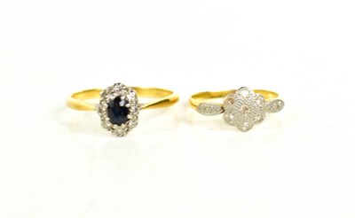 Lot 81 - An 18ct gold and diamond flower head form ring,...