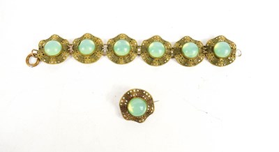Lot 157 - A vintage metal and green stone cabochon set...