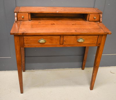 Lot 517 - An antique desk, with raised back containing...