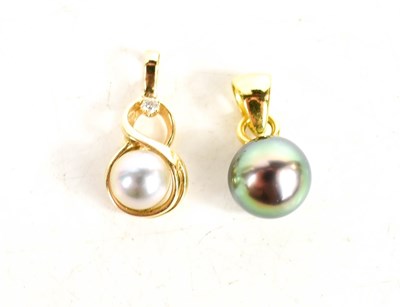 Lot 126 - Two gold and pearl pendants: an 18ct gold and...