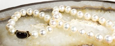 Lot 40 - A 19th century pearl necklace, with gold,...