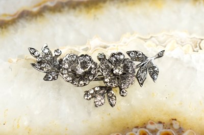 Lot 25 - A white metal and paste brooch in the form of...