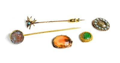 Lot 117 - A gold, turquoise and pearl hat pin in the...