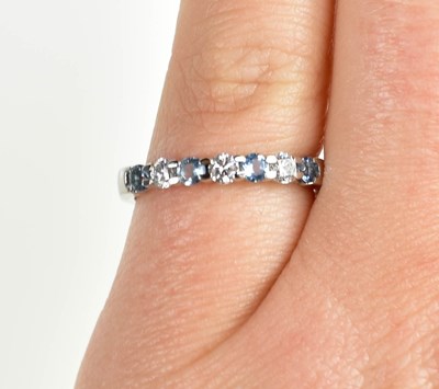 Lot 9 - A Fenton aquamarine, platinum and diamond ring,...