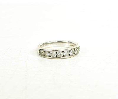 Lot 79 - An 18ct white gold and Tolkowsky diamond half...