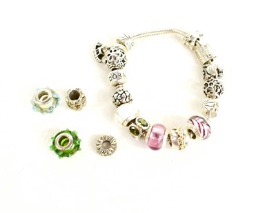 Lot 118 - A Pandora silver charm bracelet, together with...