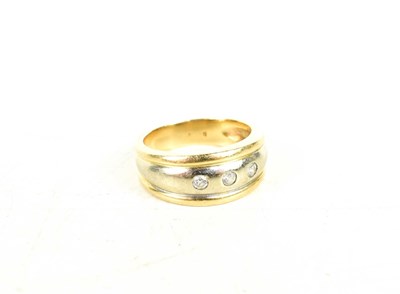 Lot 48 - A 9ct gold and diamond ring, the white gold...