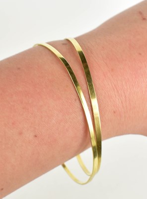 Lot 66 - Two 14ct gold bangles, of plain form, 9.5g,...