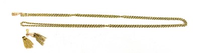 Lot 99 - A gold ropetwist necklace, with two tassels,...