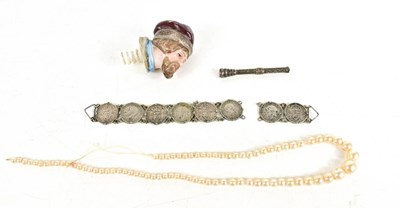 Lot 119 - A German pottery bottle screw top, in the form...