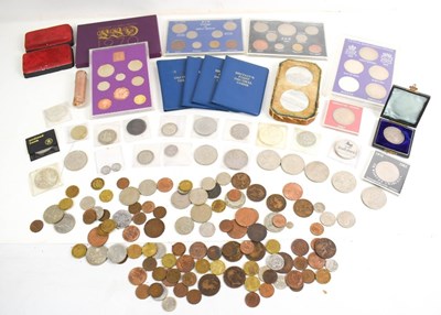 Lot 246 - A selection of coins to include Shillings,...