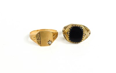 Lot 42 - Two 9ct gold signet rings, one set with black...