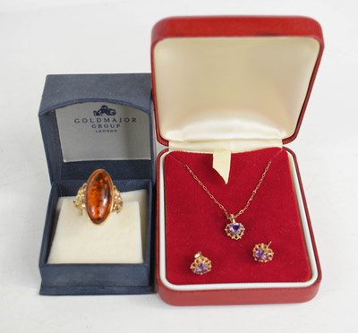 Lot 166 - A 9ct gold and amber ring, size M, 4.8g, and a...