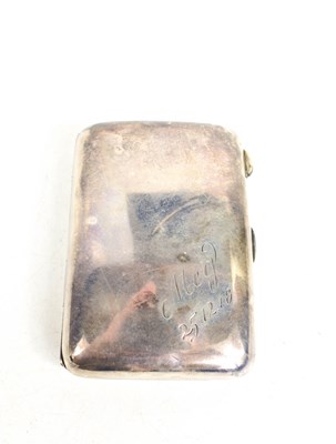 Lot 204 - A silver cigarette case of curved form,...