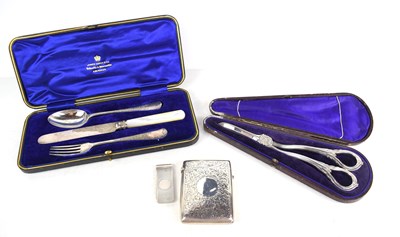 Lot 213 - A silver cigarette case of curved form,...